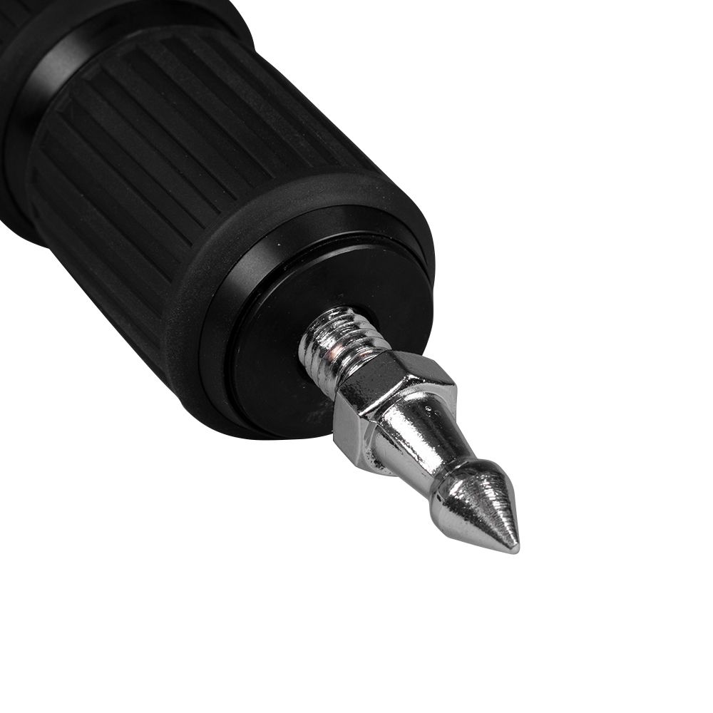 A close up of a black pen with a metal tip on a white background.