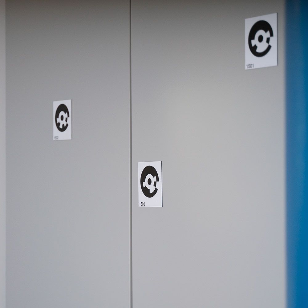 A door with a sticker on it that says c on it