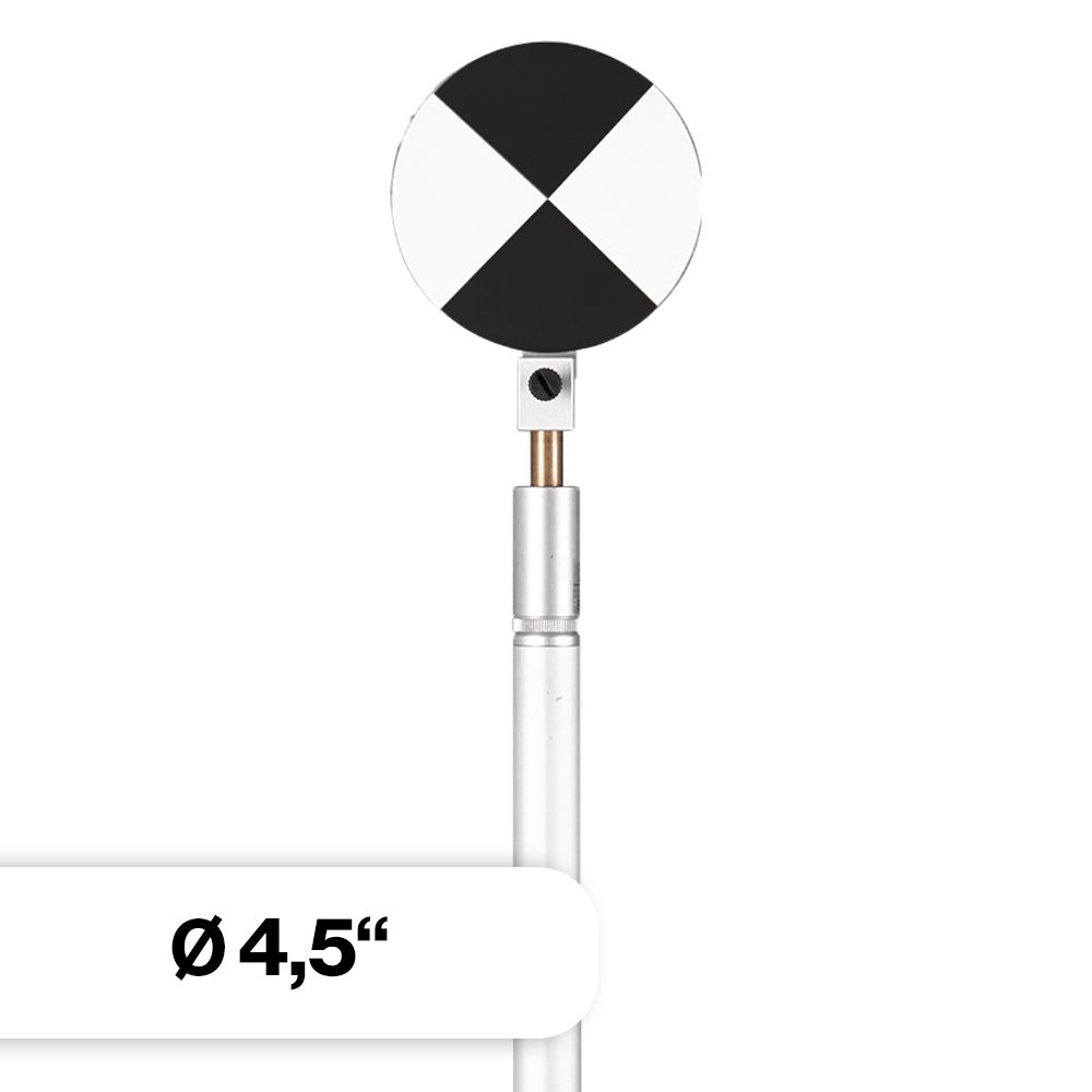 A white pole with a black and white circle on it.