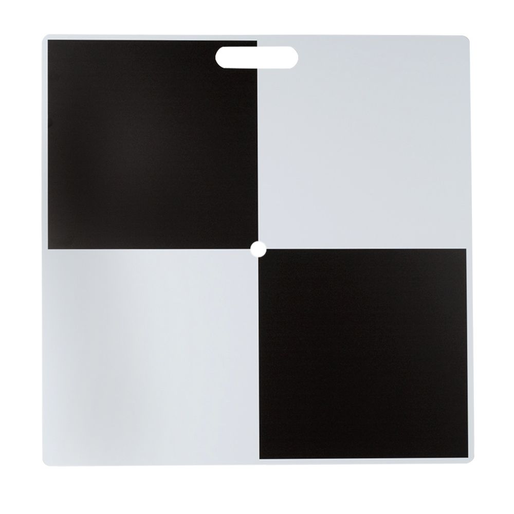 A black and white cutting board with a handle