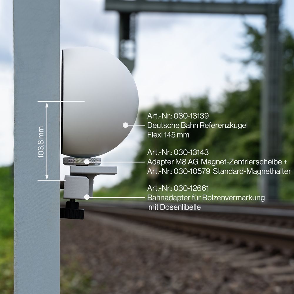 A white ball is attached to a pole with measurements on it