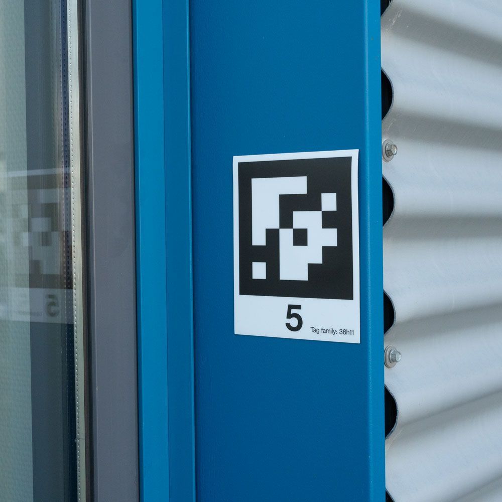 A blue door with a sticker on it that says 5