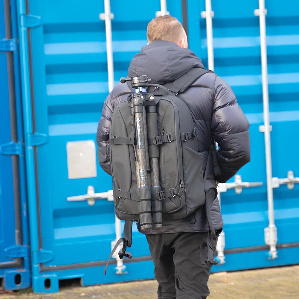 A black backpack with a foam container inside of it