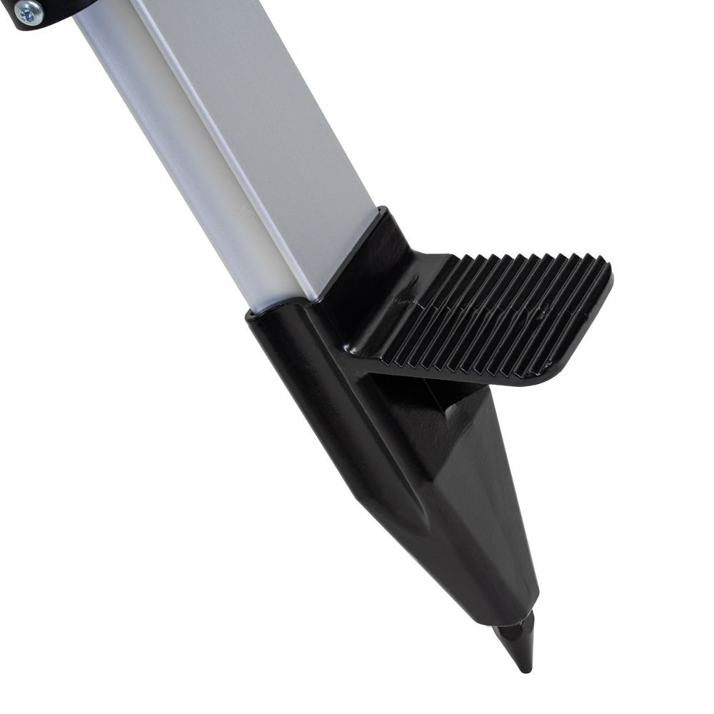 A close up of a metal pole with a black rubber stopper