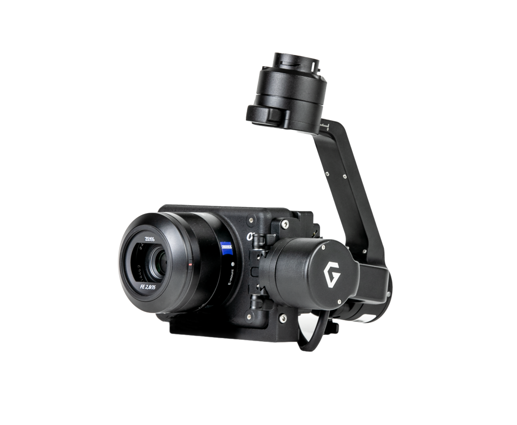 A camera with a gimbal attached to it on a white background.