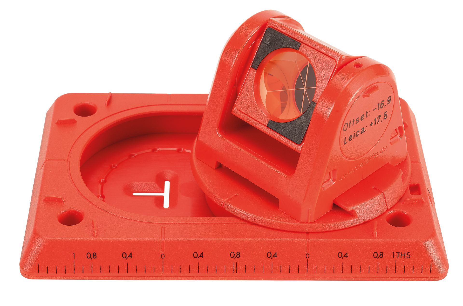 A red measuring device with the letter t on it