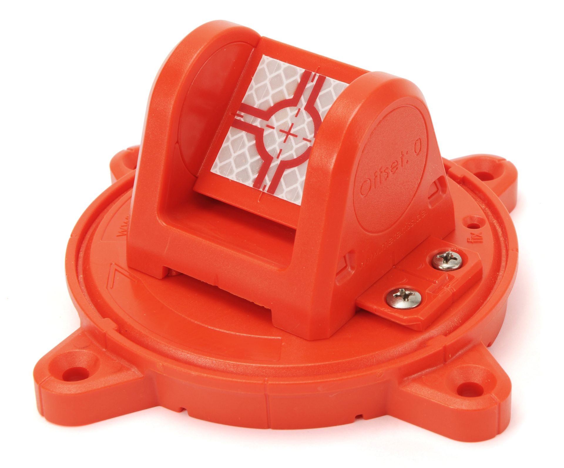 A red plastic object with a reflective square on it