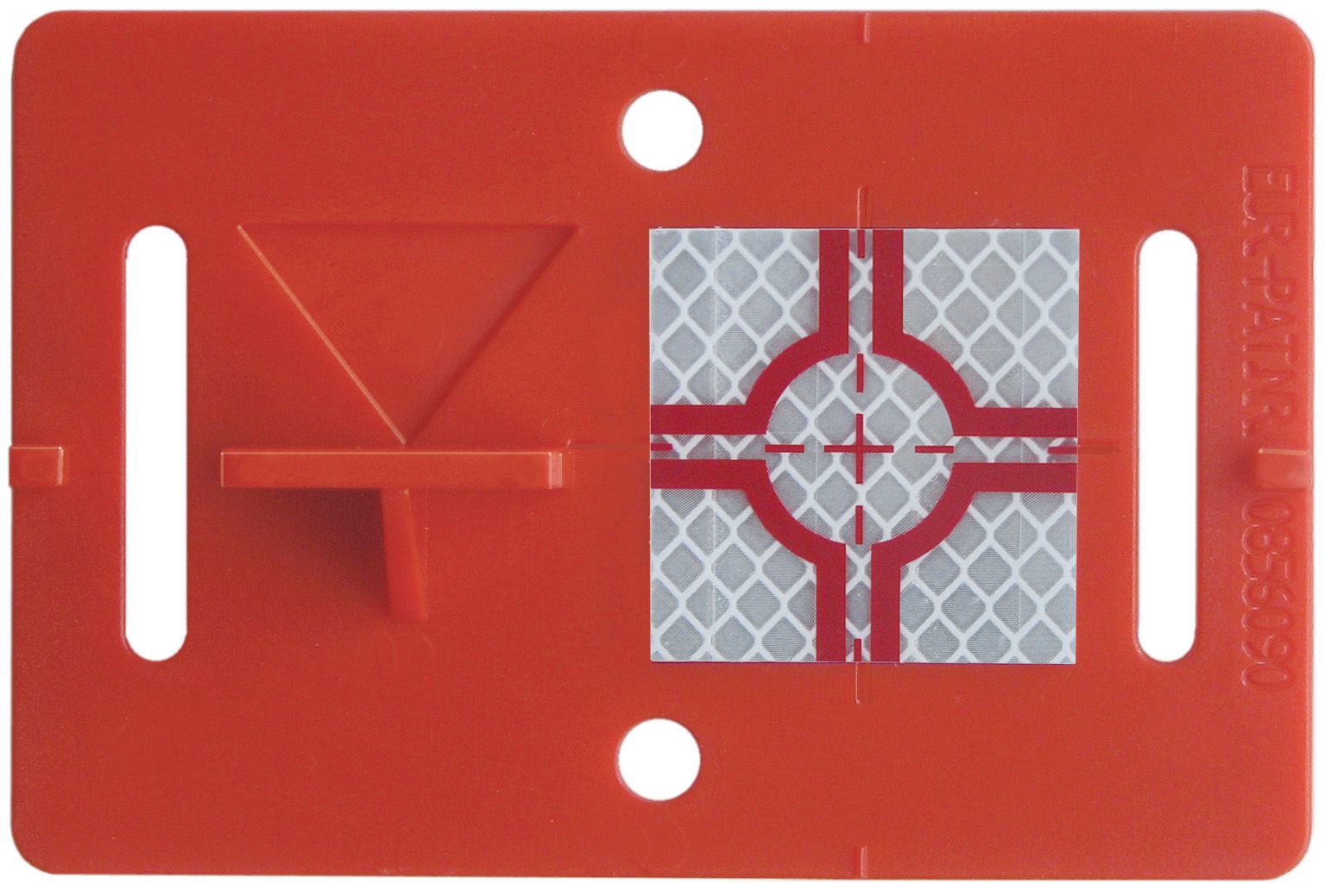 A red plastic object with a reflective square on it