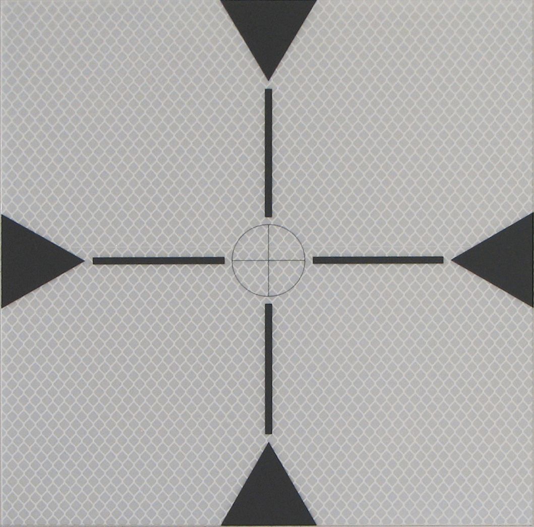 A white square with black triangles and a cross in the middle