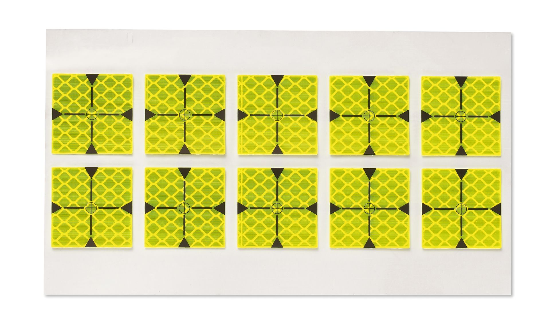 A yellow and black square with a cross in the middle