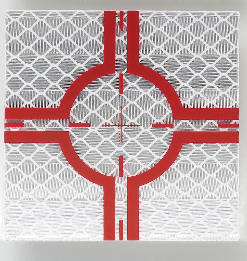 A white square with a red circle in the middle