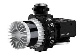 A close up of a black and white water pump on a white background.