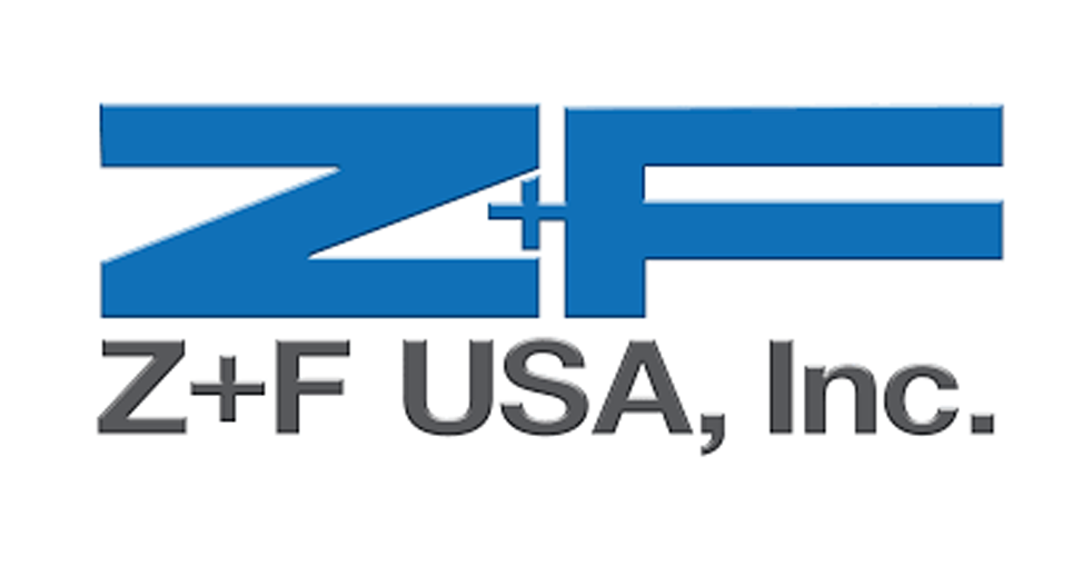 A blue and white logo for z + f usa , inc.