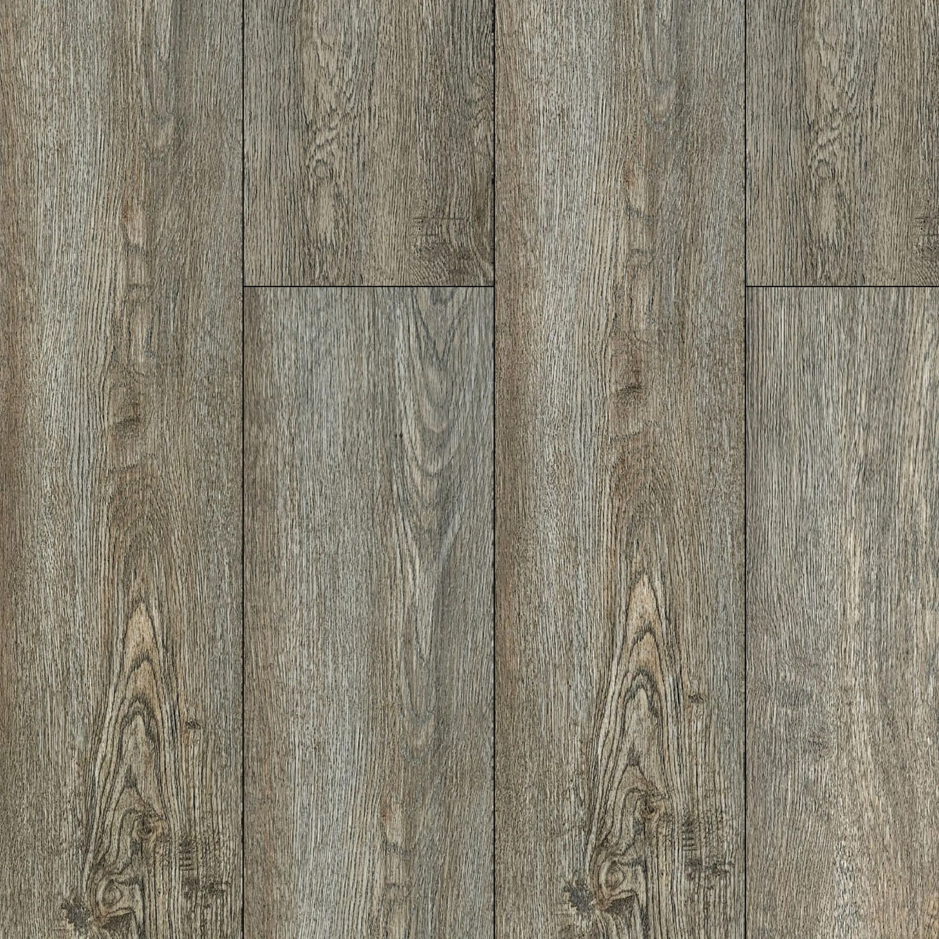 A close up of a LVP wooden floor with a grainy texture.