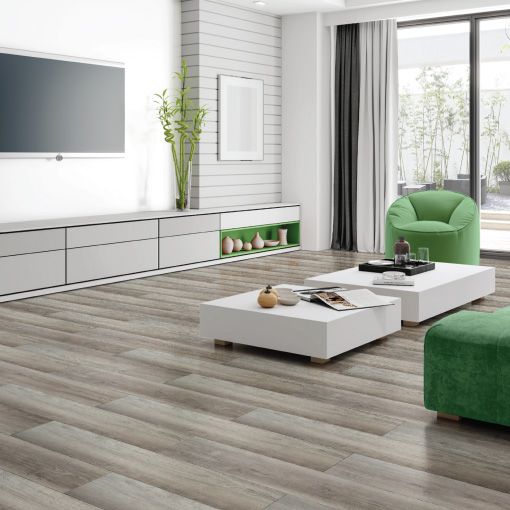 A living room with two coffee tables and a television.