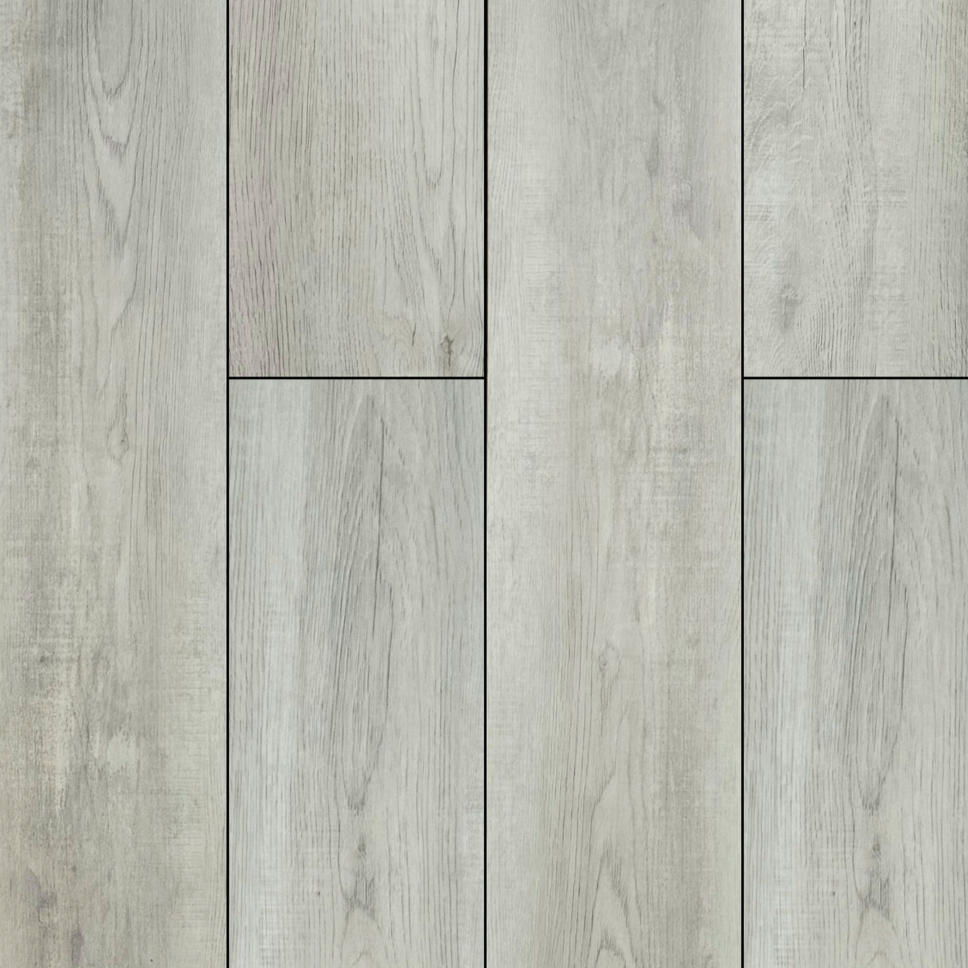A close up of a white LVP wooden floor with a black border.