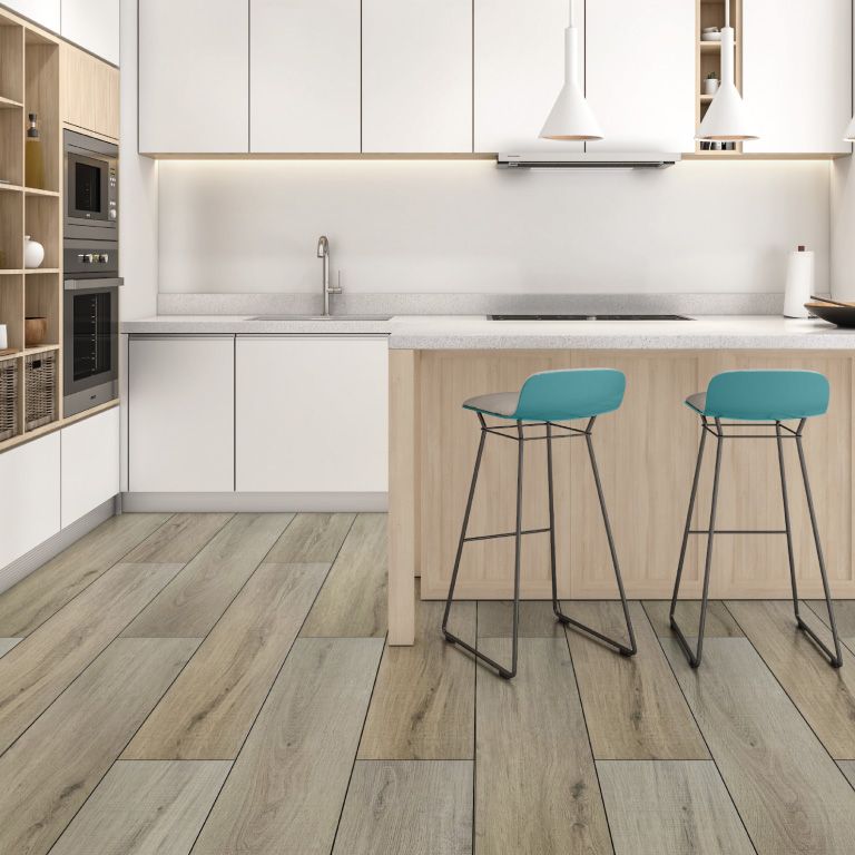 A kitchen with white cabinets and wooden floors