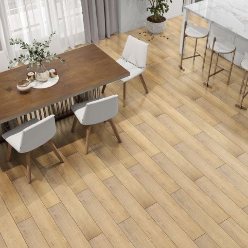 A dining room with a wooden table and chairs and a wooden floor.