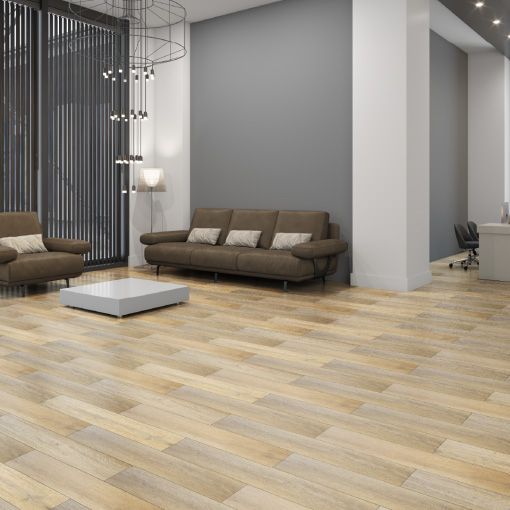 A living room with a couch , chair , and coffee table.