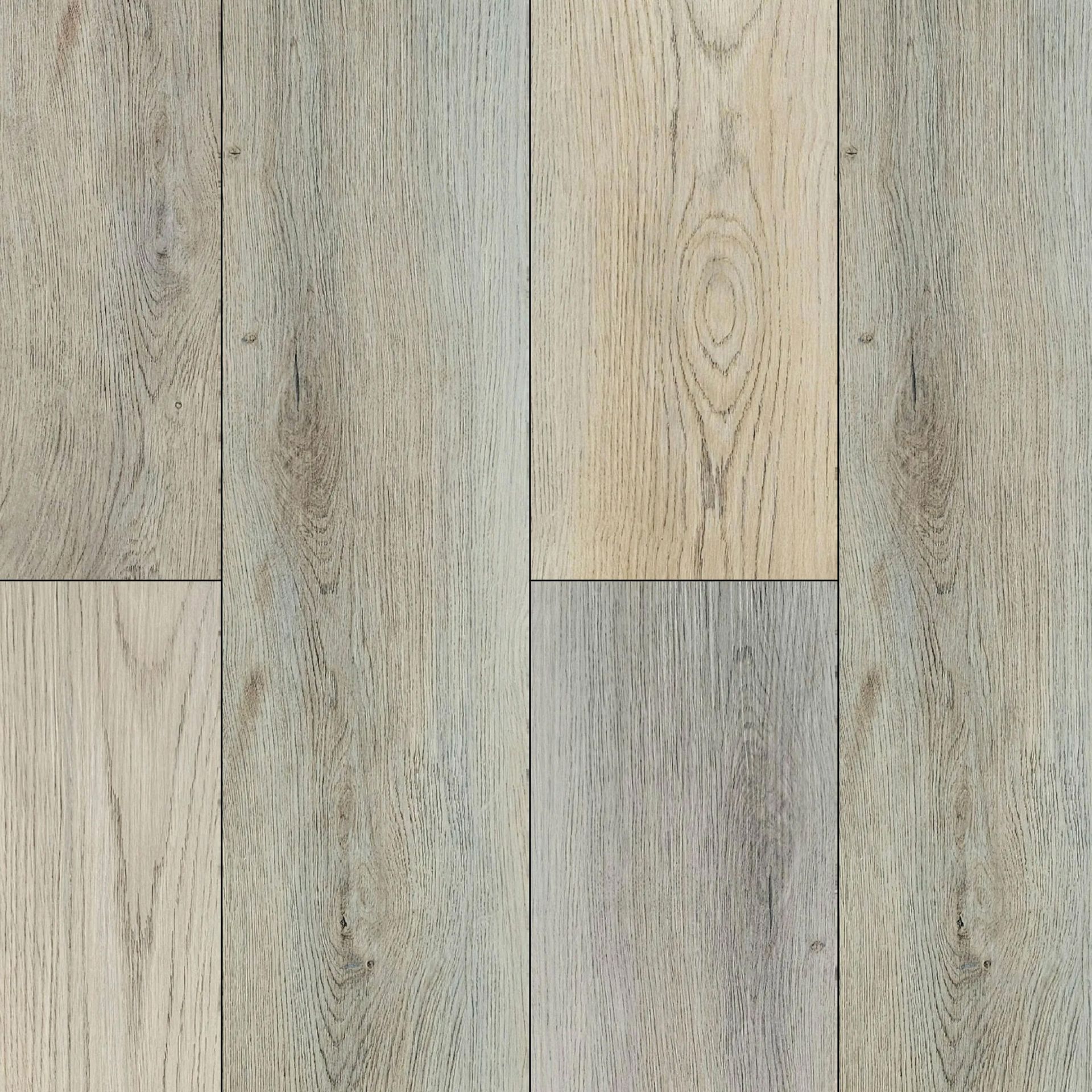 A close up of a LVP floor with a gray and white grain.