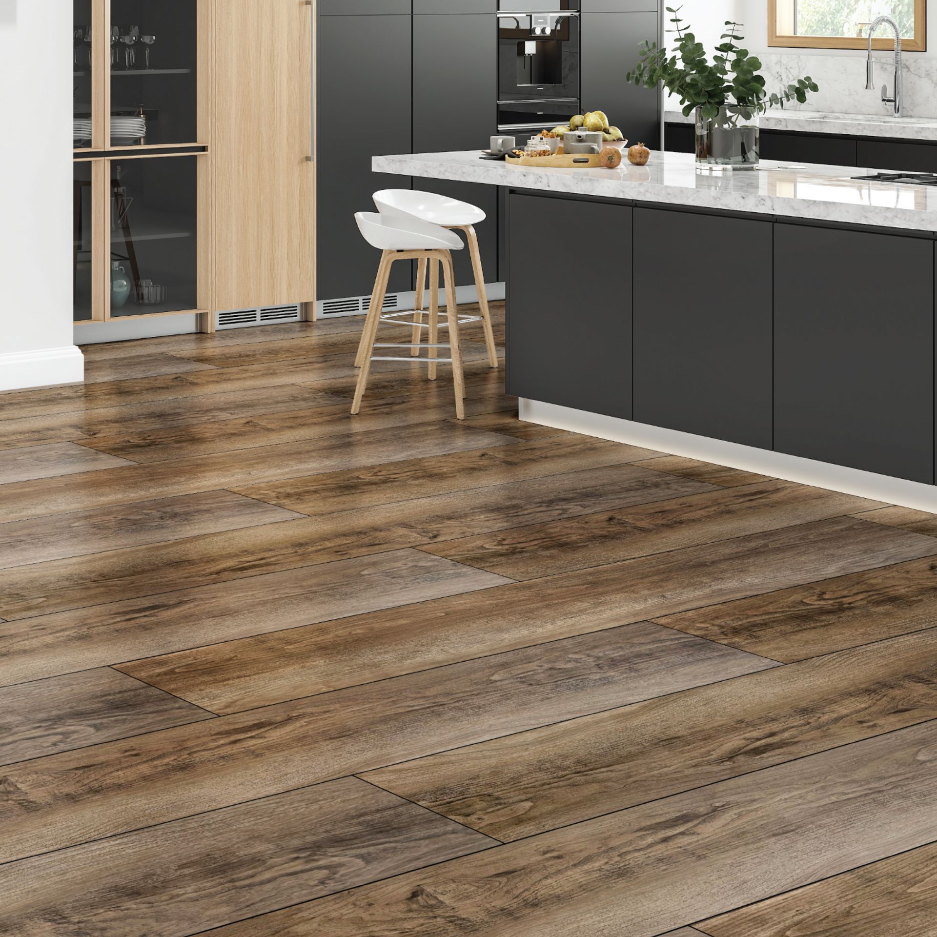 A kitchen with a LVP wooden floor and black cabinets