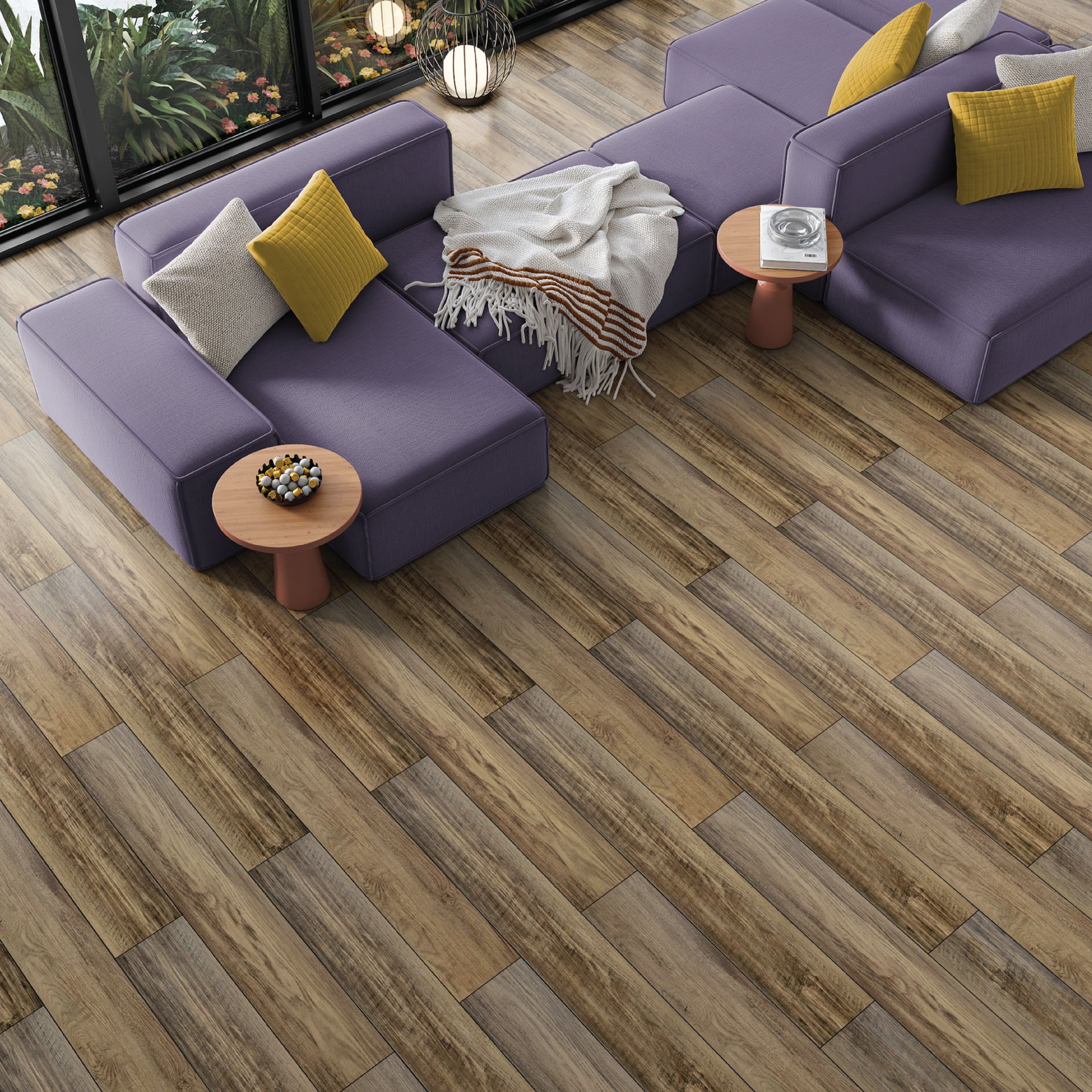A living room with a purple couch and a LVP wooden floor