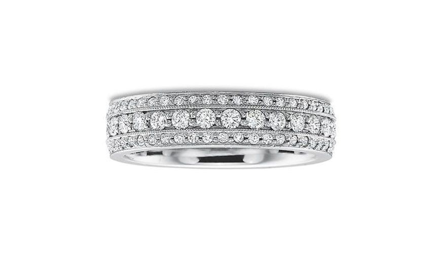 Diamond ring with three rows of stones.