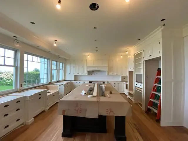 A garage with a concrete floor and a door.