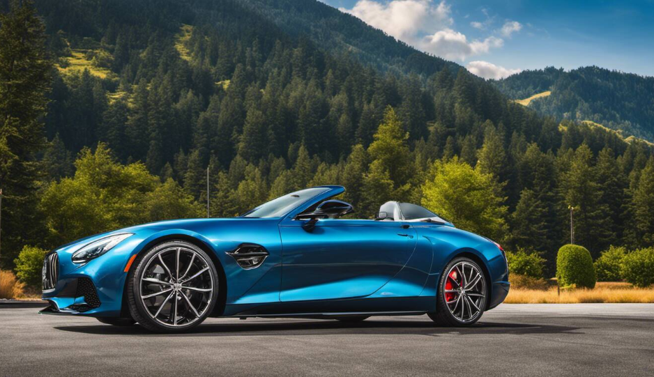 Blue convertible sports car on asphalt with a forest background.