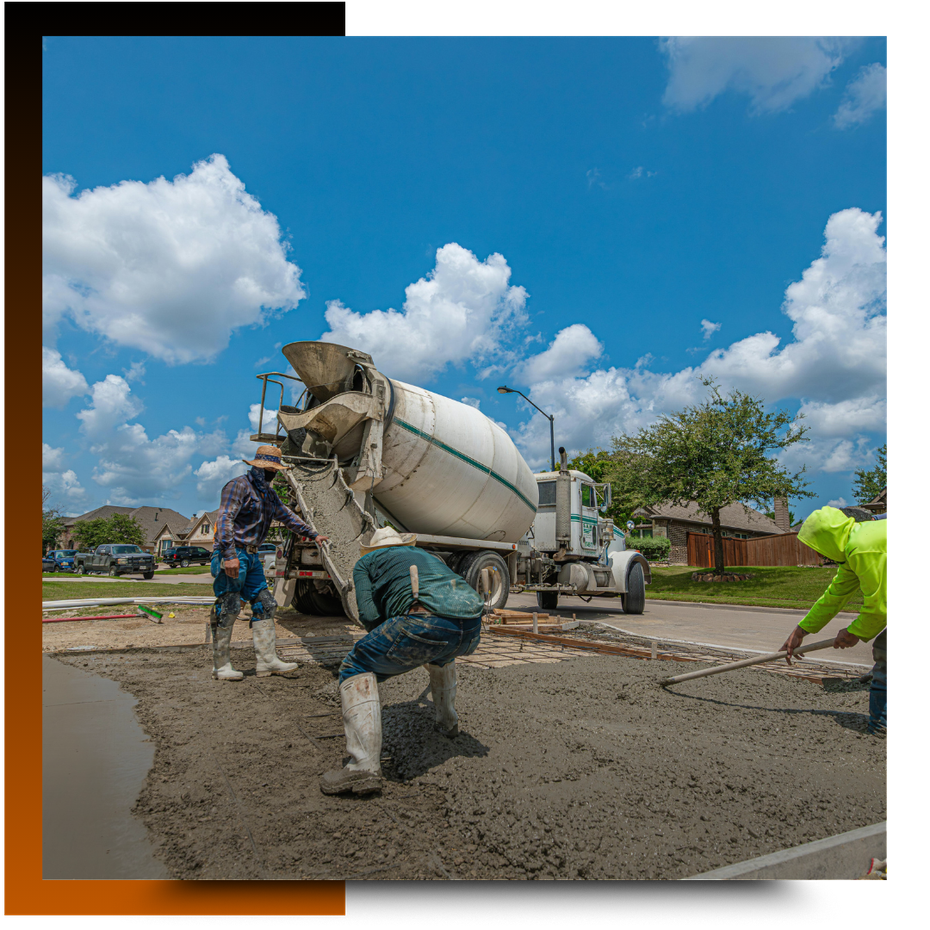 Men working on the concrete pavement