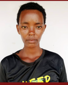 A woman wearing a black shirt with the word fed on it
