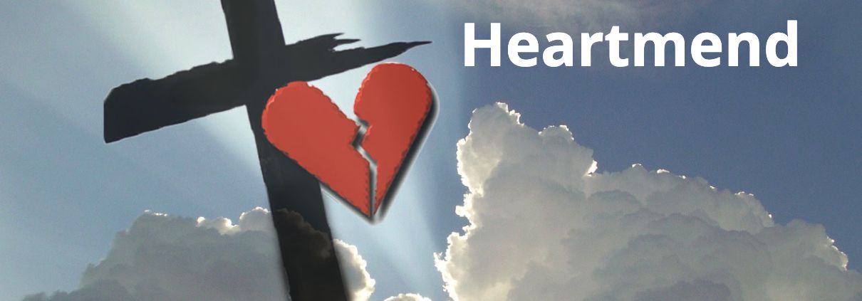 A cross with a broken heart on it and the words heartment