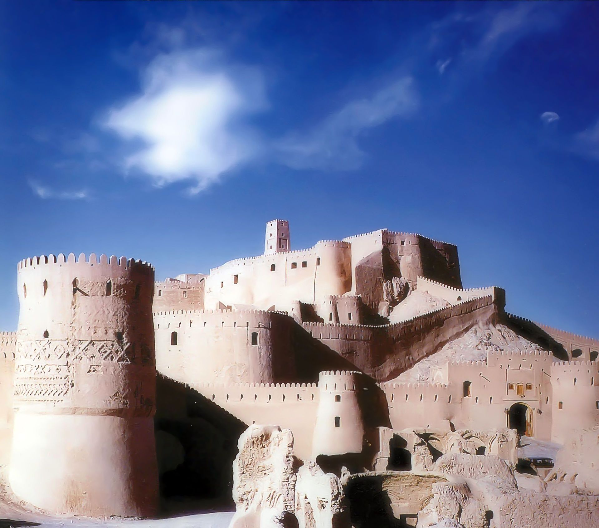 A castle with a blue sky in the background