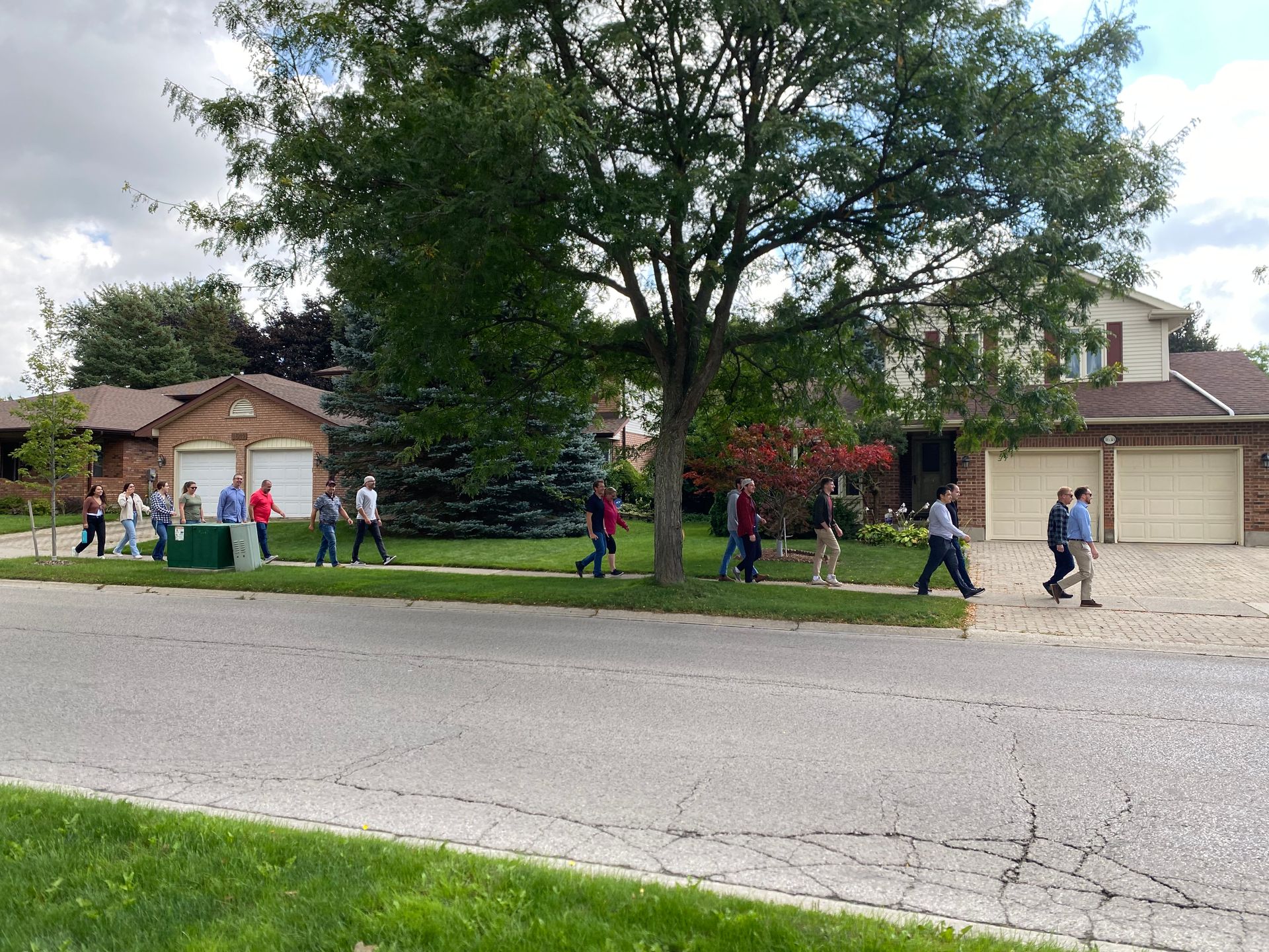 people walking down the road