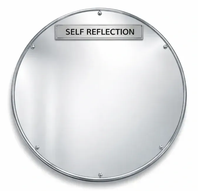 Round, metallic plaque labeled