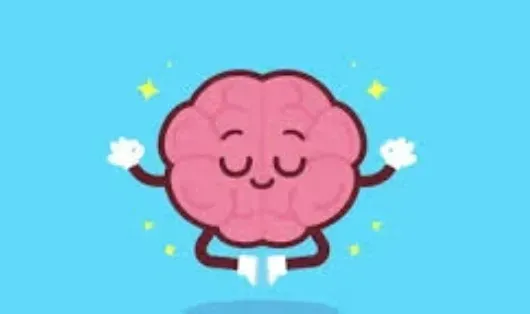 Pink cartoon brain meditating, arms up, closed eyes, white gloves & socks, blue background.