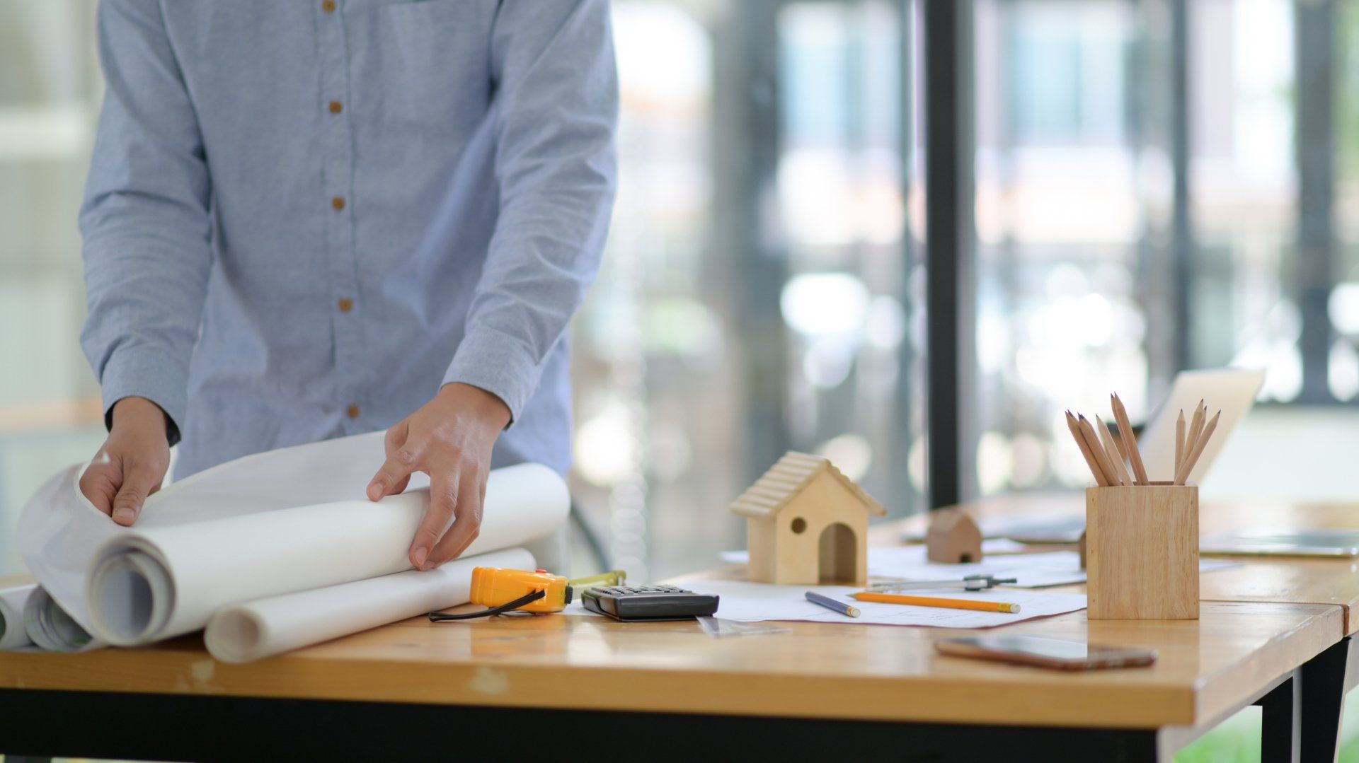 an architect collecting the construction plan
