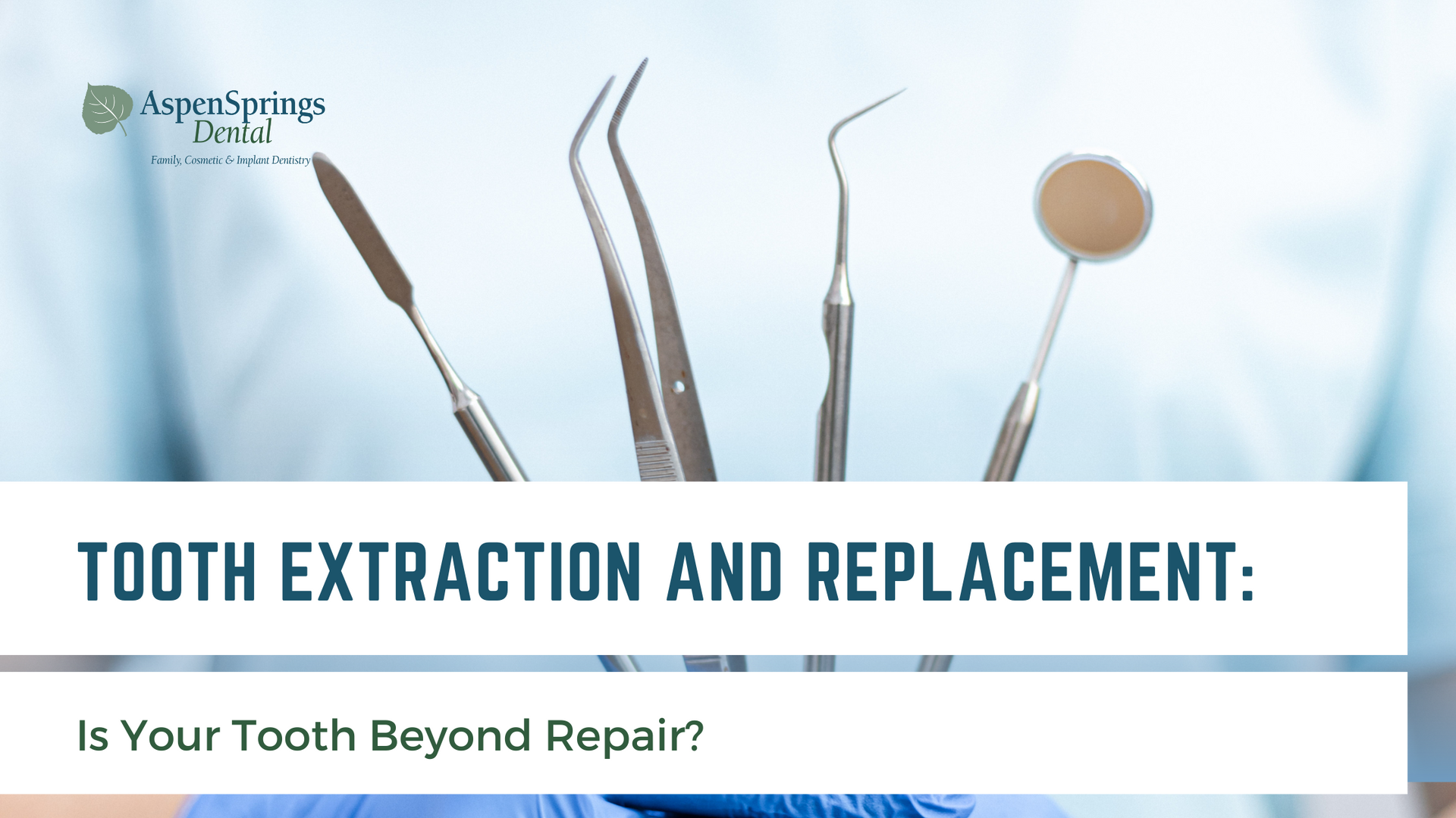 A dentist is holding a tooth extraction and replacement tool.