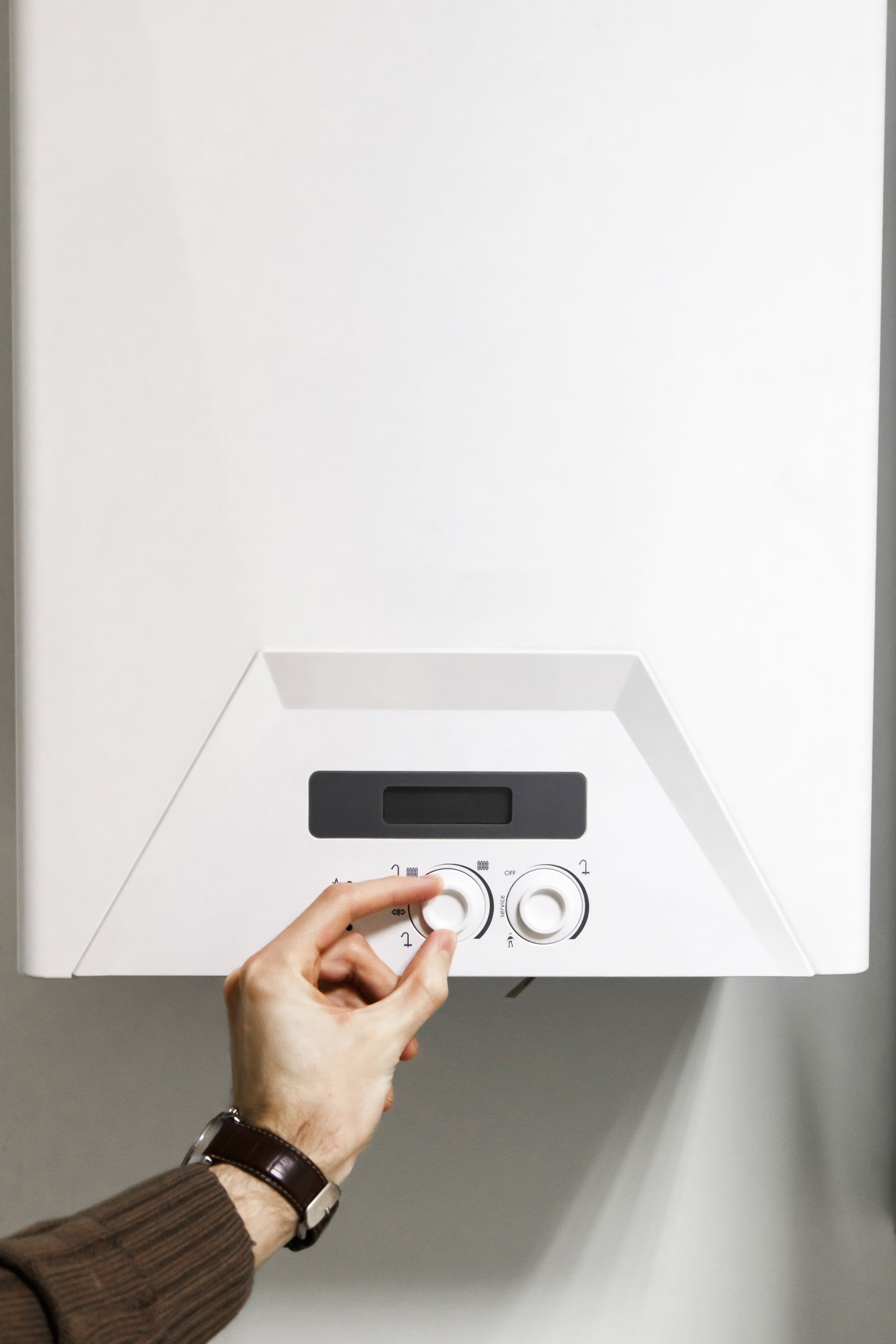 hand adjusting water heater