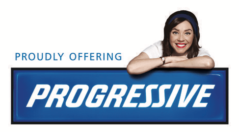 A woman is leaning on a progressive sign.
