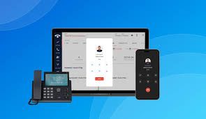 VoIP technology: Computer, phone, and smartphone interface, showing a dialing screen with a contact icon.