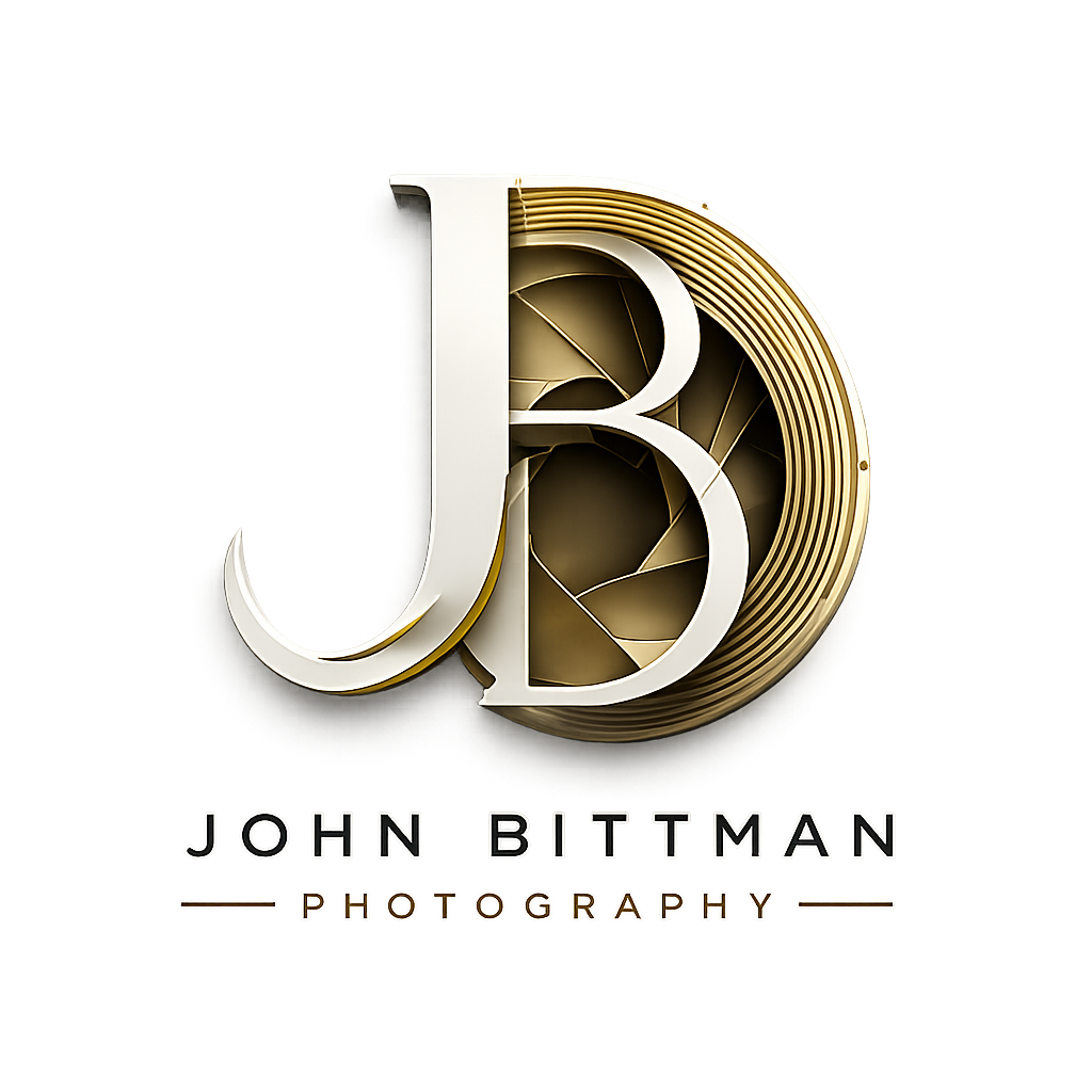John Bittman Photography logo with gold and white stylized JB monogram
