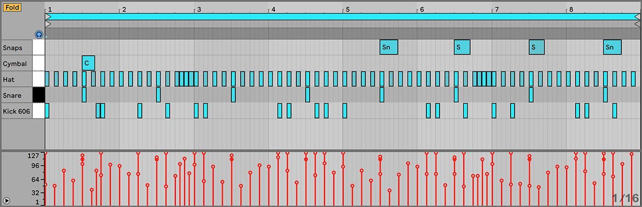 A computer screen shows a few lines of music