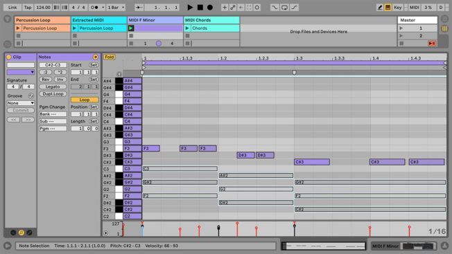 A computer screen shows a sequence of music being created