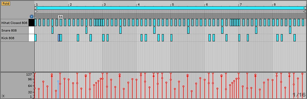 A computer screen shows a few lines of music
