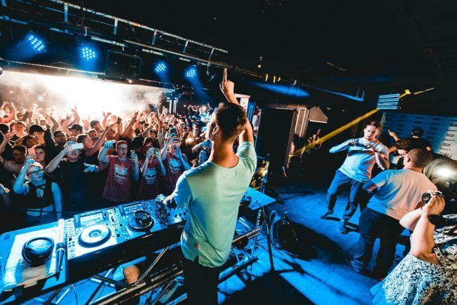 DJ on Stage with Music Booking Agent