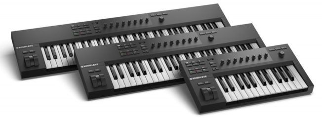 Three keyboards are stacked on top of each other on a white background.