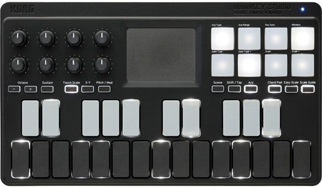 A black keyboard with white keys and a screen