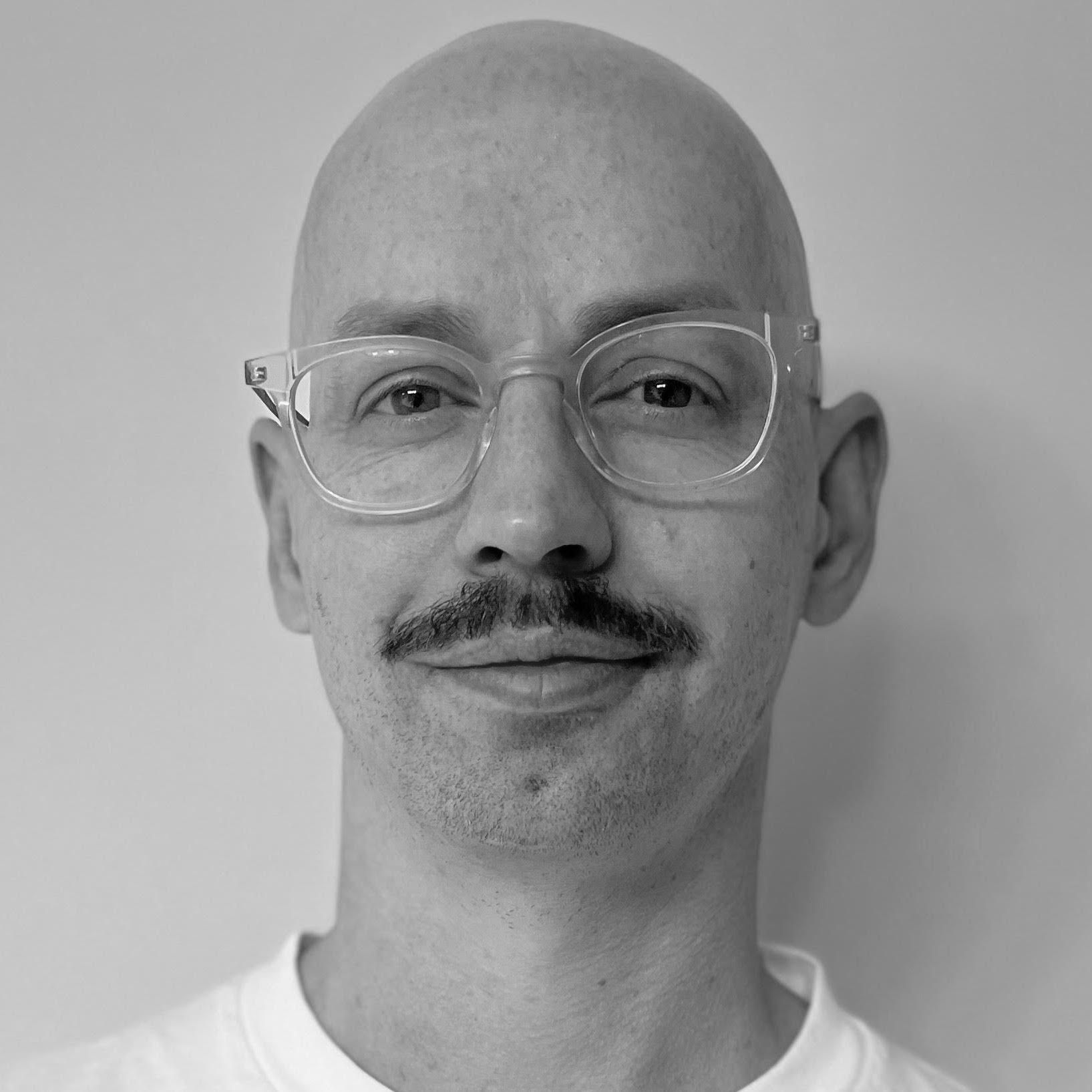 A black and white photo of producer Matthew Nordstrom.