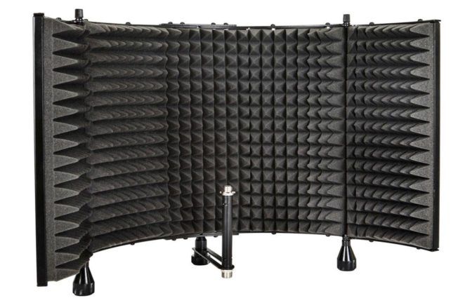 A microphone is sitting in front of a foam shield